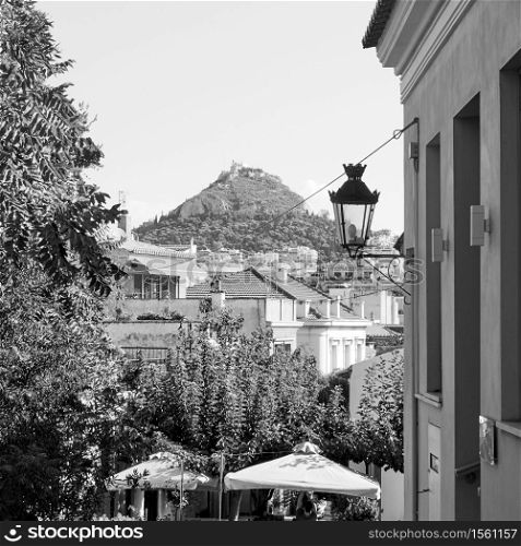 Plaka district and Lycabettus hill in Athens, Greece. Black and white photography, cityscape