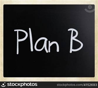 ""Plan B" handwritten with white chalk on a blackboard"
