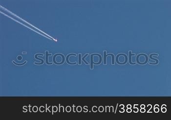 plane and contrail,UK.