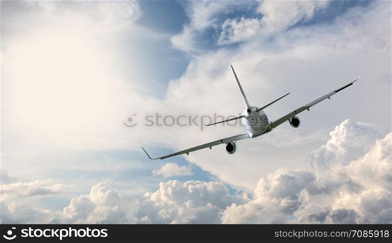 plane flying away in the sky