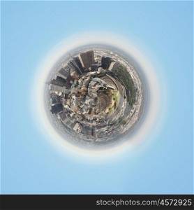 Planet earth with city on it against sky background