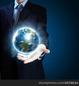 planet system in your hands. Planet System in Your Hand. Conceptual Image. Elements of this image furnished by NASA.