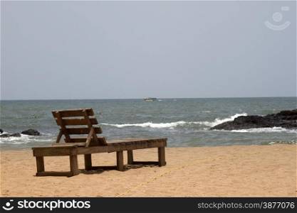 Plank bed on a beach. India Goa. Plank bed on a beach. India Goa.