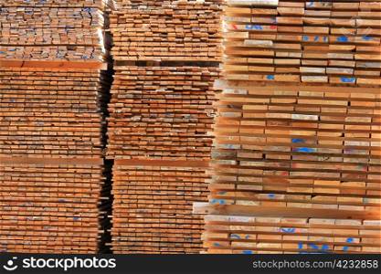 Planks of wood for pallets stacked
