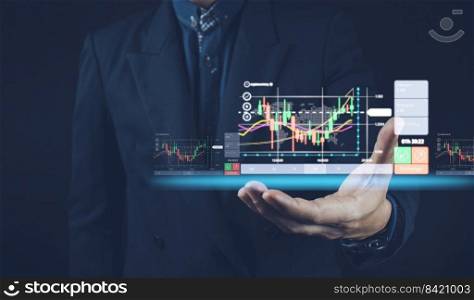 planning analyze indicator and strategy buy and sell, Stock market, Business growth, progress or success concept. Businessman or trader is pointing a growing virtual hologram stock, invest in trading 