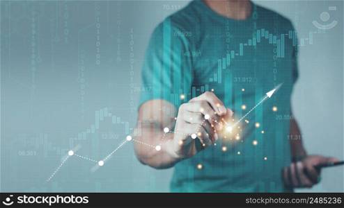 planning and strategy, Stock market, Business growth, progress or success concept. Hand of Businessman or trader touching showing a growing virtual hologram stock on smartphone, invest in trading.