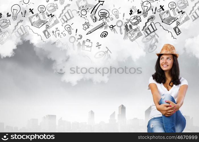 Planning future. Young pretty lady in casual dreaming about future