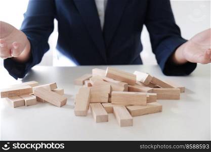 Planning risk and strategy in business. gambling failure of wooden blocks stag. Business concept for growth and success process.