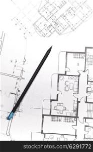 plans for residential flats with pencil closeup