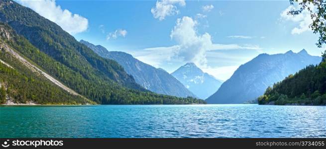 Plansee lake summer panorama with snow on mount top (Austria).