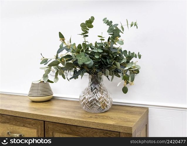 plant vase wooden furniture high angle