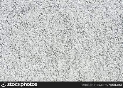 Plastered and painted facade surface of house wall as background