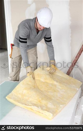 plasterer doing repairs in house