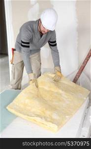 plasterer doing repairs in house
