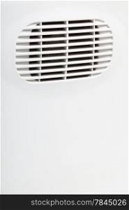 plastic air vent in white wall ventilation grille