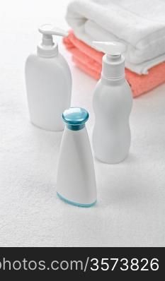 plastic bottles with towels
