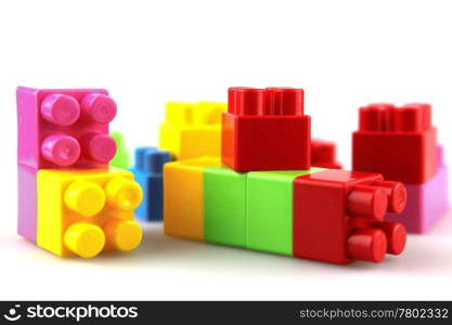 Plastic building blocks on a white background