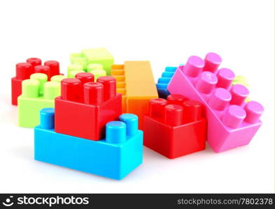 Plastic building blocks on a white background