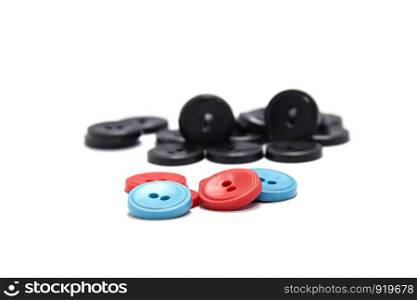 Plastic buttons of different colors. Plastic buttons of different colors. buttons on a white background
