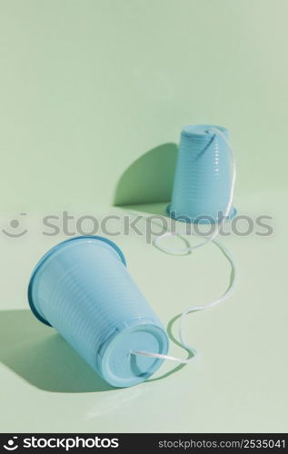plastic cups attached with string