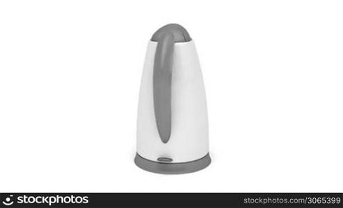 Plastic electric kettle rotates on white background