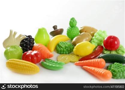 Plastic game, fake varied vegetables and fruits