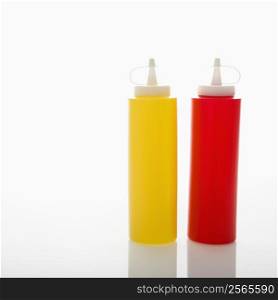 Plastic ketchup and mustard containers.