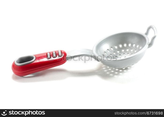 plastic kitchen utensil to avoid damage to the pots and pans