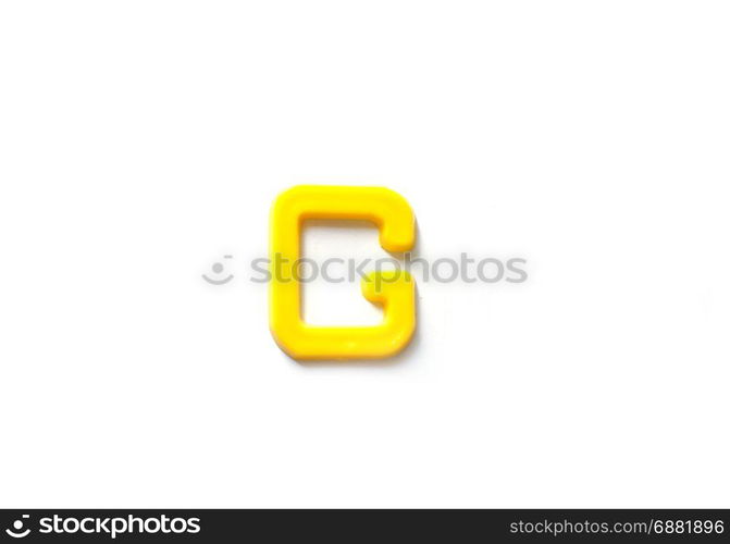 Plastic letters G isolated white background.