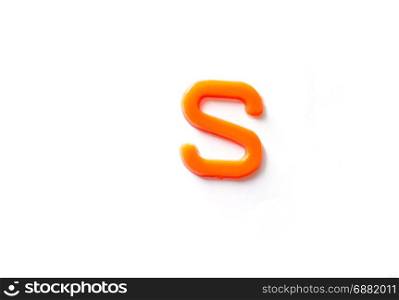 Plastic letters S isolated white background.