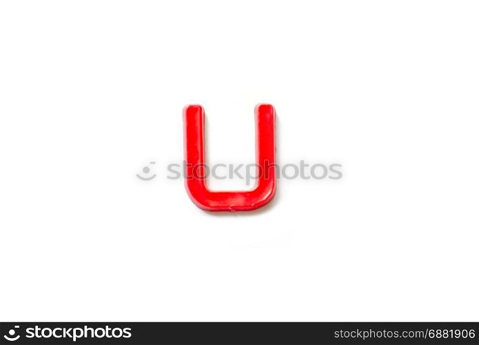 Plastic letters U isolated white background.