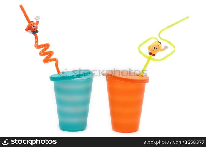 Plastic orange and blue glasses pipe for cocktail on white background