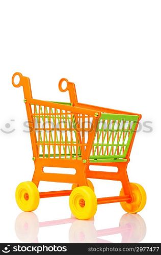 Plastic shopping cart against the white background