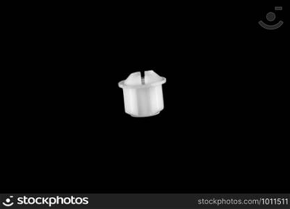 plastic toilet screw on black isolated background