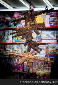 Plastic toy rifles on sale in a toy shop
