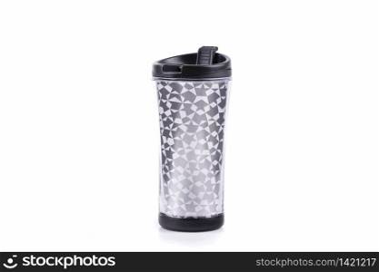 plastic tumbler glasses or thermos travel cup isolated on white background