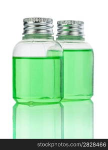 plasticals bottle with green liquid