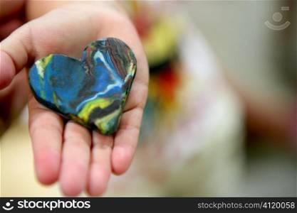 Plasticine brown and blue abstract heart