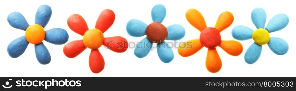 Plasticine flowers in a row isolated over the white background