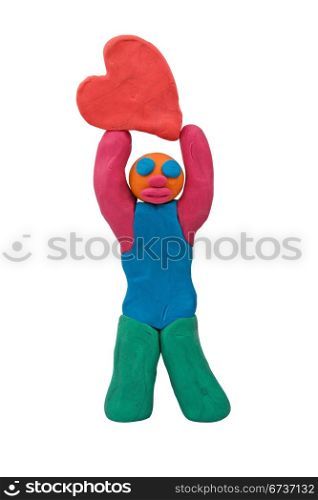 plasticine man hold heart. isolated on white