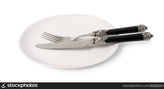 Plate and cutlery. Isolated on white background. plate and cutlery