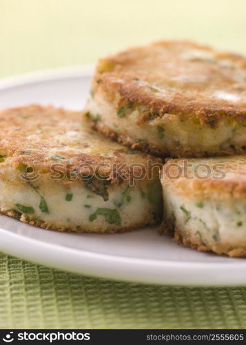 Plate of Bubble and Squeak cakes