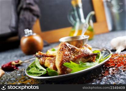 plate of chicken wings on a table