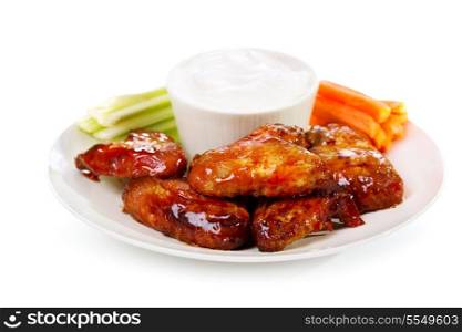 plate of chicken wings on white background