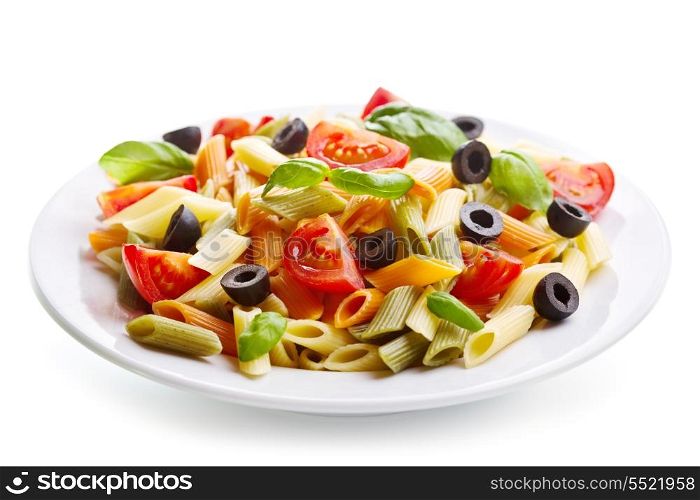 plate of colorful pasta with vegetables on white background