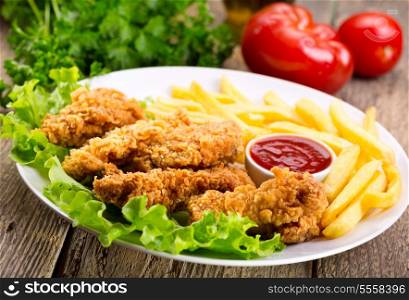 plate of fried chicken with vegetable