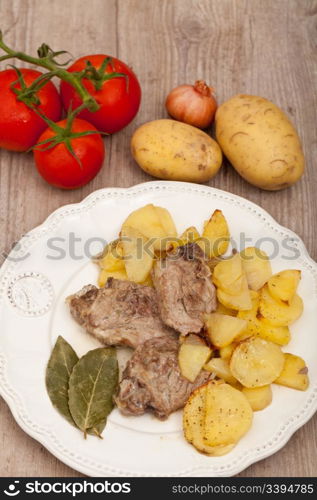 Plate of good lamb with potatoes on a white plate