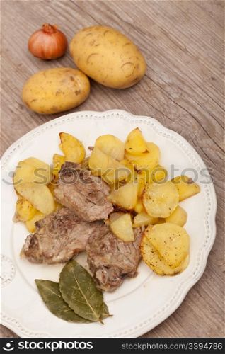 Plate of good lamb with potatoes on a white plate
