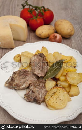 Plate of good lamb with potatoes on a white plate