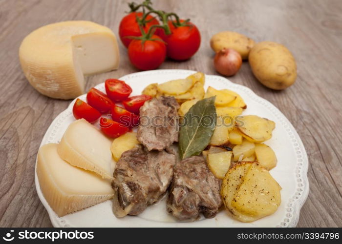 Plate of good lamb with potatoes on a white plate